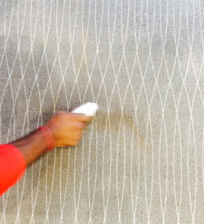 Applying the stain treatment - Big Red Carpet Cleaners, Singapore