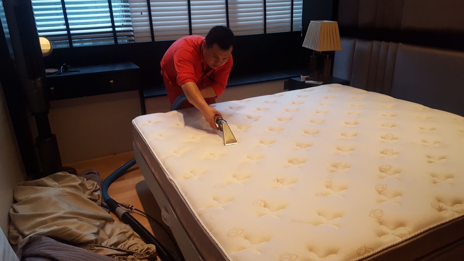 Deep cleaning a quilted mattress in a Singapore bedroom