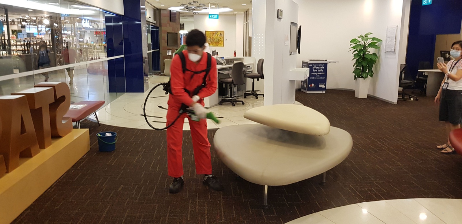 Cleaning upholstered seating at a commercial venue