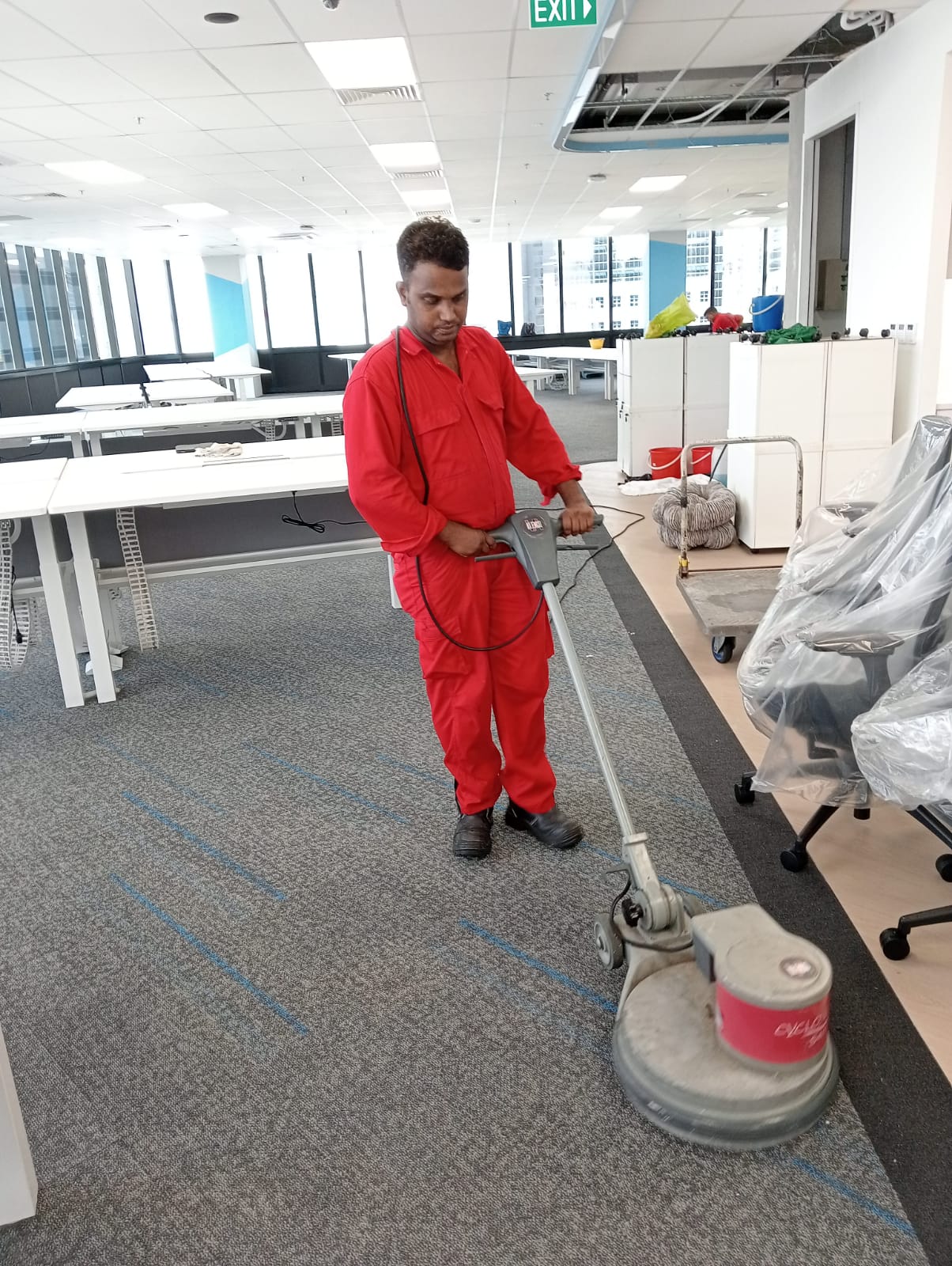 Professional carpet cleaning machine on office broadloom carpet